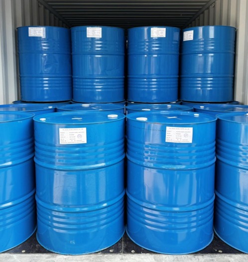 Blue food-grade barrels inside a shipping container
